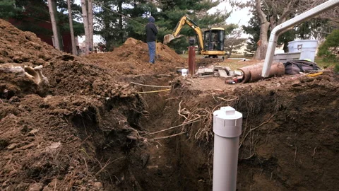 Excavating crew installs pipe underground P1540576 Stock-Footage 153242993