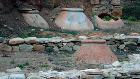 Excavation of ancient structures and jars. Old town. Ancient storage place for Stock Footage 315179664