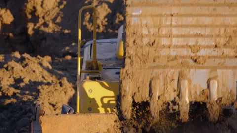 Excavation at a construction site, excavator loads the truck with earth  Stock Footage 147632680