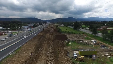 Excavation at the edge of the highway Stock Footage 93101965