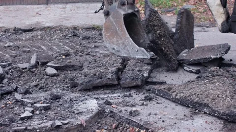 Excavation Process Involves the Removal of Asphalt and Concrete Pavement Video stock 320847168