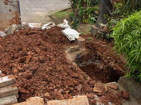 Excavation of underground cables Foto stock