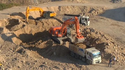 Excavation work with bucket for construction Stockbeeldmateriaal 129571948