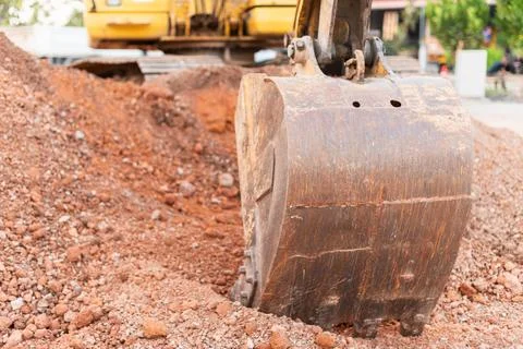 Excavation work progress construction site urban environment close-up view .. 스톡 사진