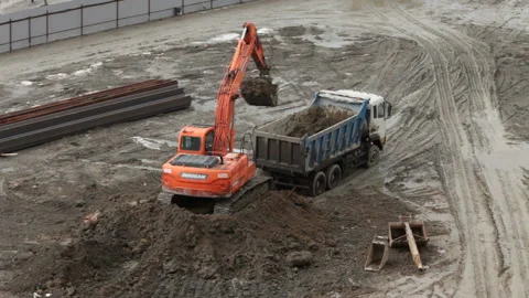 Excavator accurate loading  Dump Truck Stock Footage 104003058