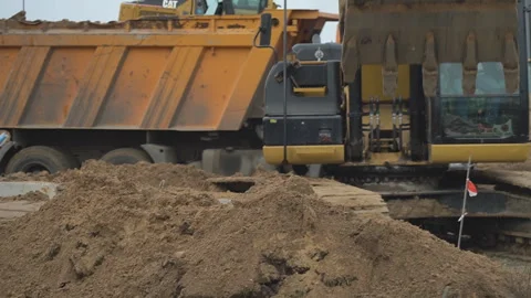 Excavator in action at the construction site. S Stock Footage 243453485