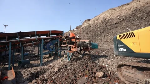 Excavator And Conveyor Sorting Waste At Delhi Landfill Reclamation Site Stock Footage 248058557
