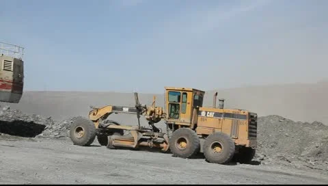 The excavator and grader in open pit mine Stock Footage 11056078