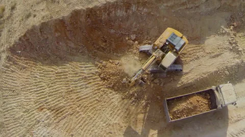 Excavator and loader in a construction site-  Aerial Shot Vidéo 26442911