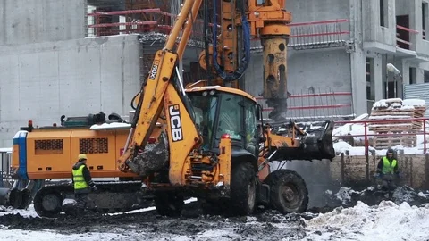 Excavator and pile rig machine at construction site. Stock Footage 71532820