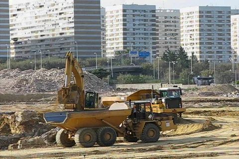 Excavator and trucks in construction Video stock 110909