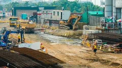 Excavator and worker working at construction site, time lapse. Video stock 22178595