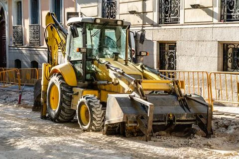 Excavator back hoe loader on contruction site Stock Photos