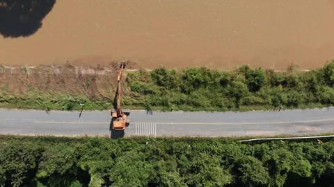 Excavator backhoe extracting soil and dirt Video stock 97987667