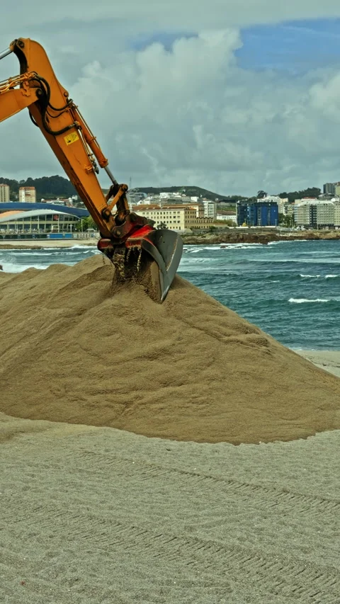 Excavator at Beach Construction cliff Stock Footage 277107975