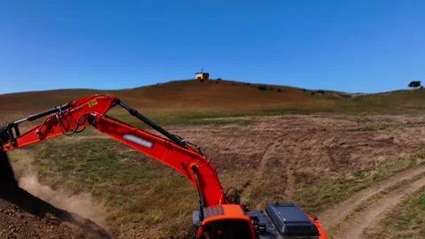 Excavator with big shovel Excavator digging soil pits on construction site. Stock Footage 304564115