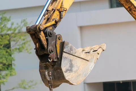 Excavator bucket, close-up. Construction work Stock Photos