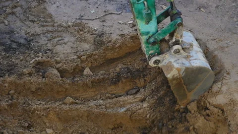 Excavator bucket by digging soil Video stock 224738930