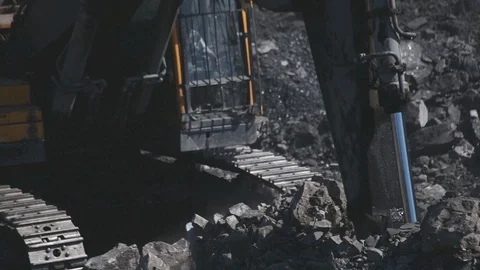 An excavator bucket digs coal Stock-Footage 114819310