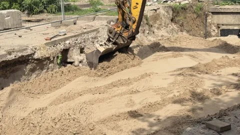 Excavator, bucket, dumping, sand, construction, machinery, heavy, industrial Stock Footage 317764340