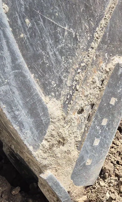 Excavator bucket scooping soil – Vertical 9:16 스톡 동영상 344030959