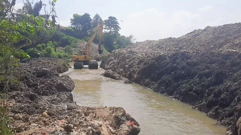 Excavator is cleaning the river Stock Footage 313674195