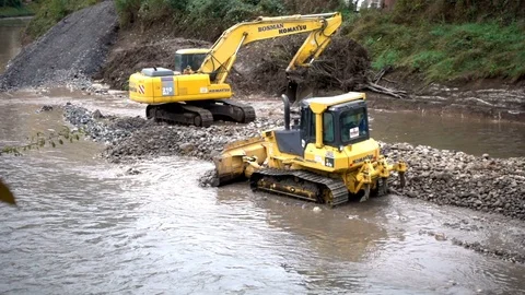 The excavator cleans the river - 1 Stock Footage 81374143