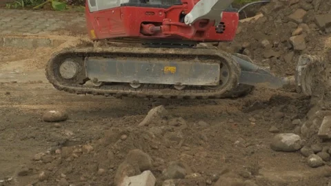 Excavator clearing road Stock Footage 168246478