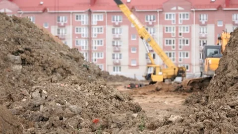 Excavator, construction crane work on construction Stock Footage 77610972