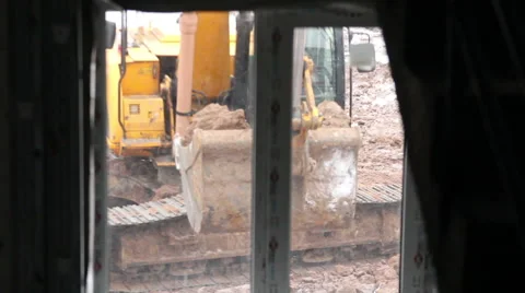 Excavator on a construction site 스톡 동영상 61834430