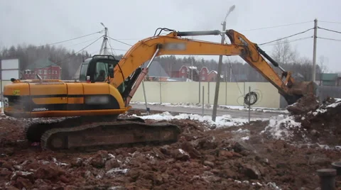 Excavator on a construction site Stock Footage 61844835