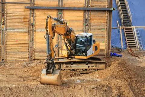 Excavator on the construction site Stock Photos