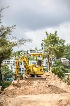 Excavator on construction site Stock Photos