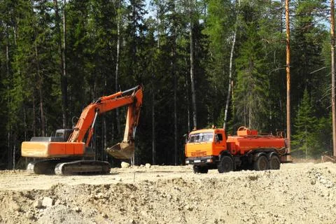 Excavator on construction site Stock Photos