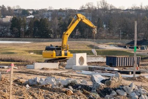 Excavator on a construction site Stock Photos