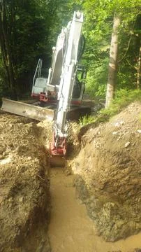 Excavator at a construction site Stock Photos