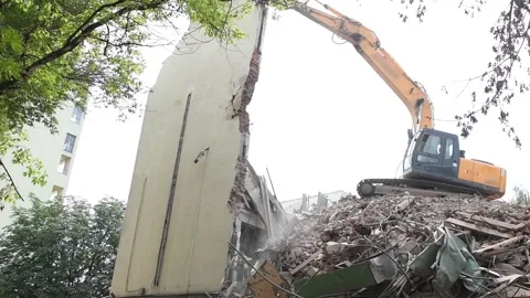 Excavator crasher machine at demolition on construction site Video stock 94389245
