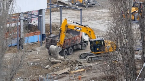 Excavator Destroying Building Floor Stock Footage 87183711