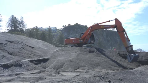 Excavator digging and moving shingle Stock Footage 43469356