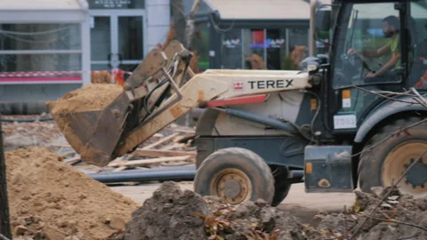 The excavator digging and takes ground on a Construction Site in the city. Stock Footage 158238536