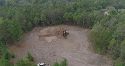 Excavator Digging Basement in Woods 4k Stock Footage 81754089
