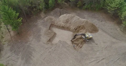 Excavator Digging Basement in Woods Drone Aerial 4k Stock Footage 81754264
