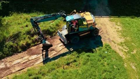 Excavator digging with bucket during construction site earthworks. Heavy machine Stock Footage 311320124
