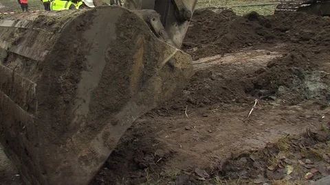 Excavator digging close-up Stockbeeldmateriaal 79611784