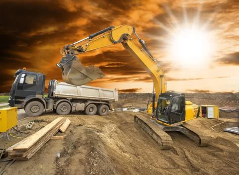 Excavator is digging on construction site Stock Photos