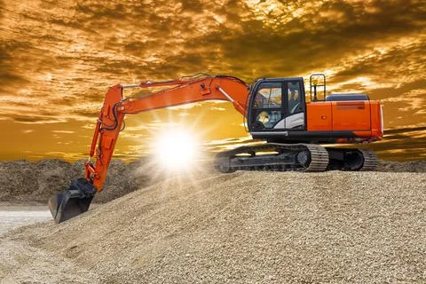 Excavator is digging on construction site Stock Photos