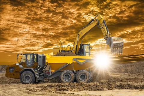 Excavator is digging on construction site Stock Photos