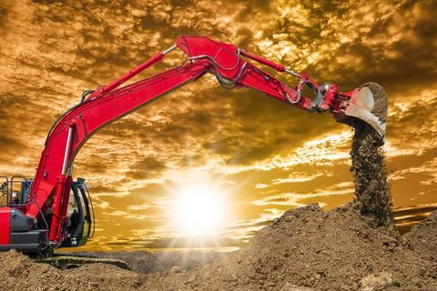 Excavator is digging on construction site Stock Photos