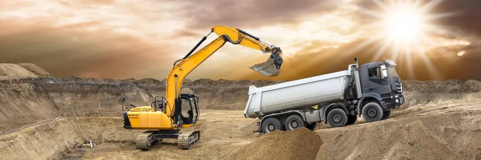 Excavator is digging on construction site Stock Photos