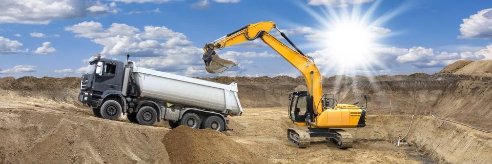 Excavator is digging on construction site Foto stock